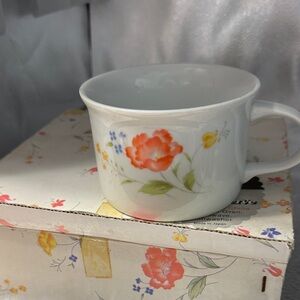 Charming Floral Mug with Orange and Yellow Accents